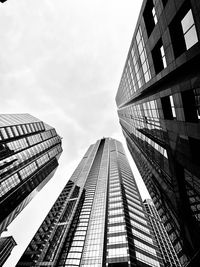 Low angle view of modern buildings against sky