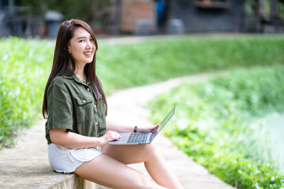 Young woman using mobile phone