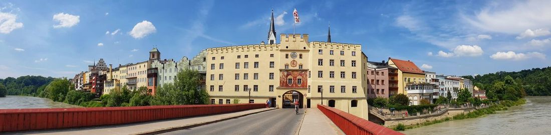 Panoramic view of buildings in wasserburg against sky