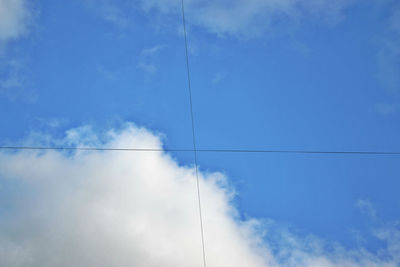 Low angle view of vapor trail in sky