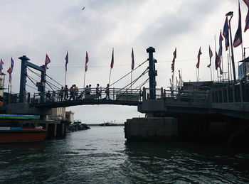 Scenic view of harbor against sky