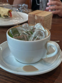 Close-up of tea cup on table