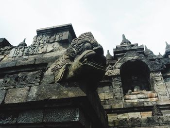Low angle view of statue against sky