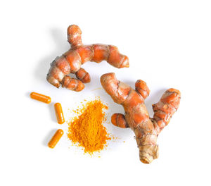 High angle view of carrots on white background