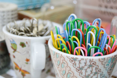 High angle view of candies in container on table