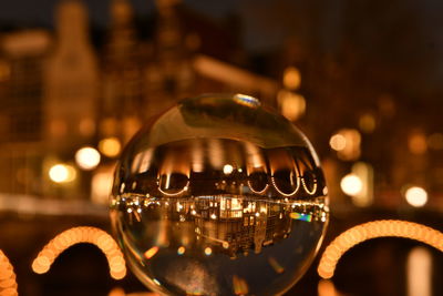 Close-up of illuminated light bulb