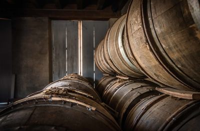Stacked wooden barrels