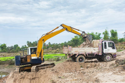 Construction site on field against sky