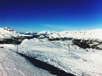 Scenic view of snowcapped mountains