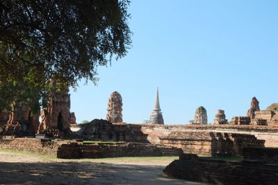 Ruins of temple against clear sky