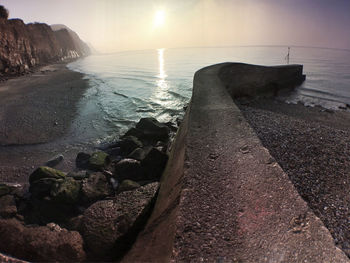 Scenic view of sea at sunset