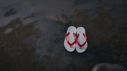 High angle view of sandals on beach