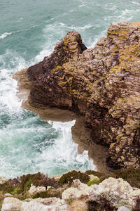 High angle view of rock formation at beach