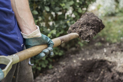 Midsection of man working