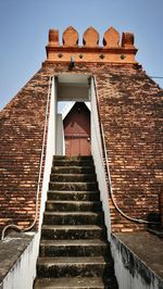 Low angle view of steps against sky