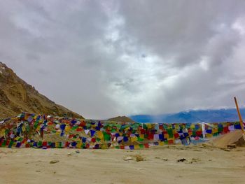 Panoramic view of beach against cloudy sky