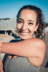 Portrait of young woman looking away