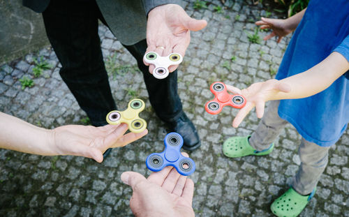 Three generations with fidget spinners