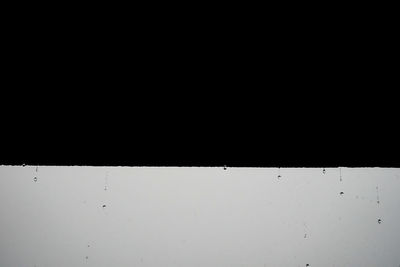 Close-up of window against white wall