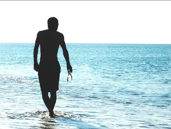 People standing on beach