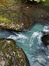 High angle view of rocks in sea