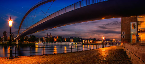 Bridge over river at night