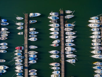 High angle view of sailboats moored in water