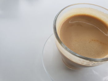 High angle view of coffee cup on table