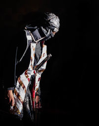 Low angle view of people at night