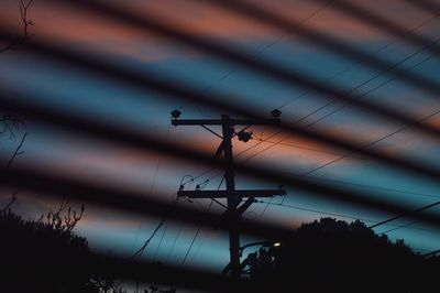 Low angle view of silhouette tree against sky during sunset