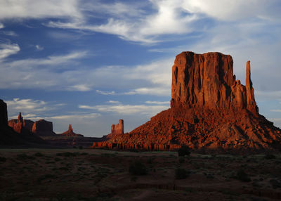 View of rock formations on landscape against sky