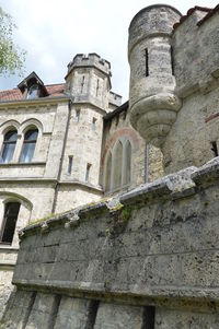 Low angle view of old building against sky