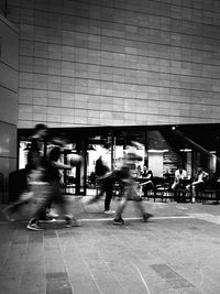 People on city street at night