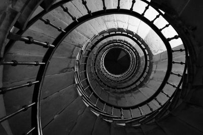 Directly below shot of spiral staircase in building