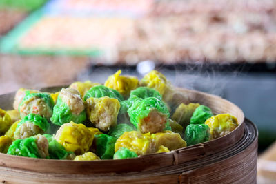 Close-up of vegetables in basket on table