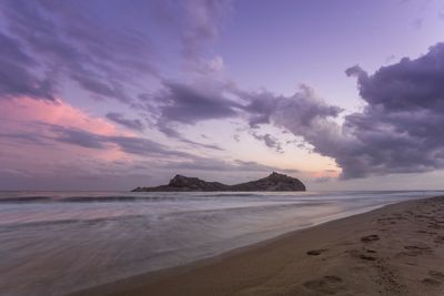 Scenic view of sea against sky at sunset