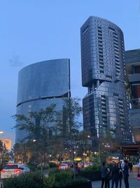 Low angle view of modern buildings against clear sky