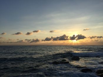 Scenic view of sea against sky during sunset