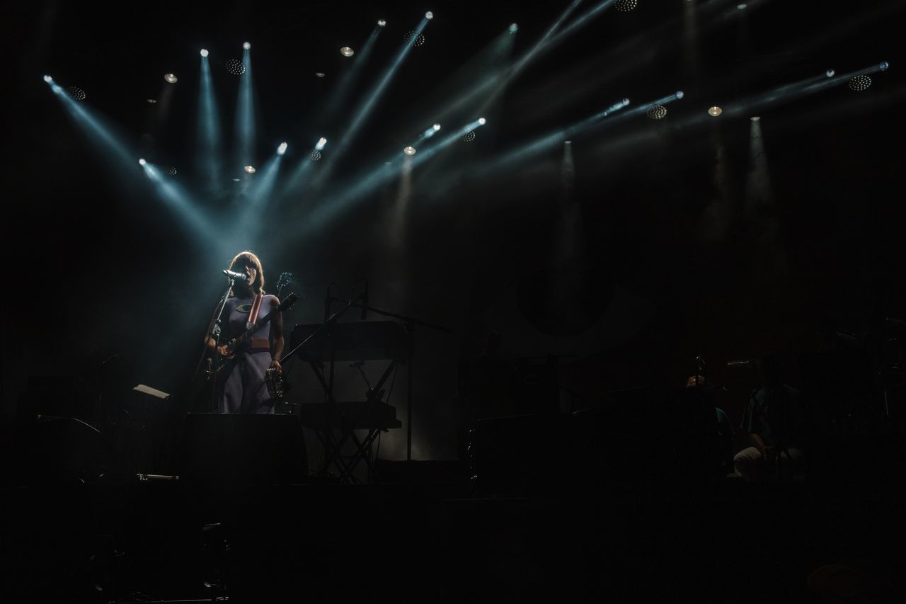 VIEW OF ILLUMINATED STAGE AT NIGHT