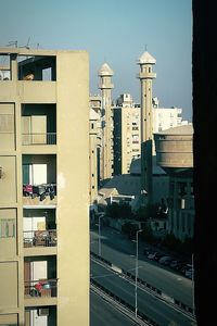 Buildings in city against sky