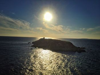 Scenic view of sea at sunset