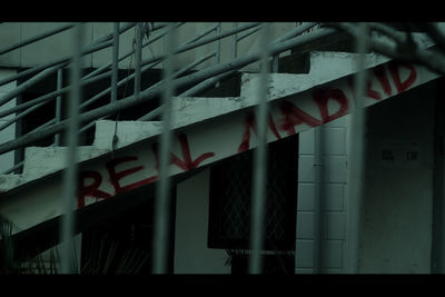 Low angle view of text on building