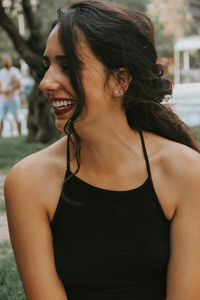 Close-up of smiling young woman