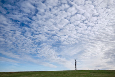 Low angle view of field against sky