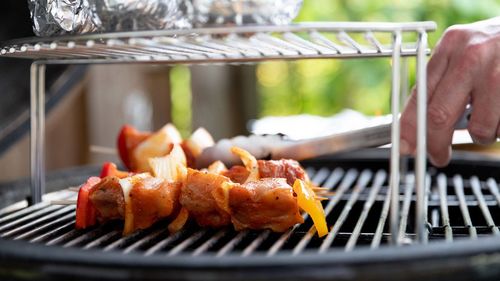 Close-up of meat on barbecue grill