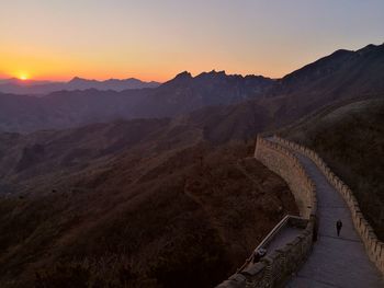 Scenic view of mountains against sky during sunset