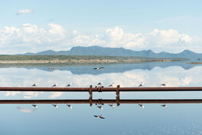 Scenic view of lake against sky and a reflection