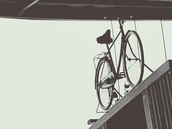 Low angle view of bicycle against sky