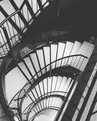 Low angle view of spiral staircase in building