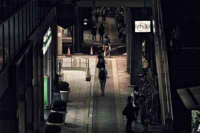 People walking in the city at night